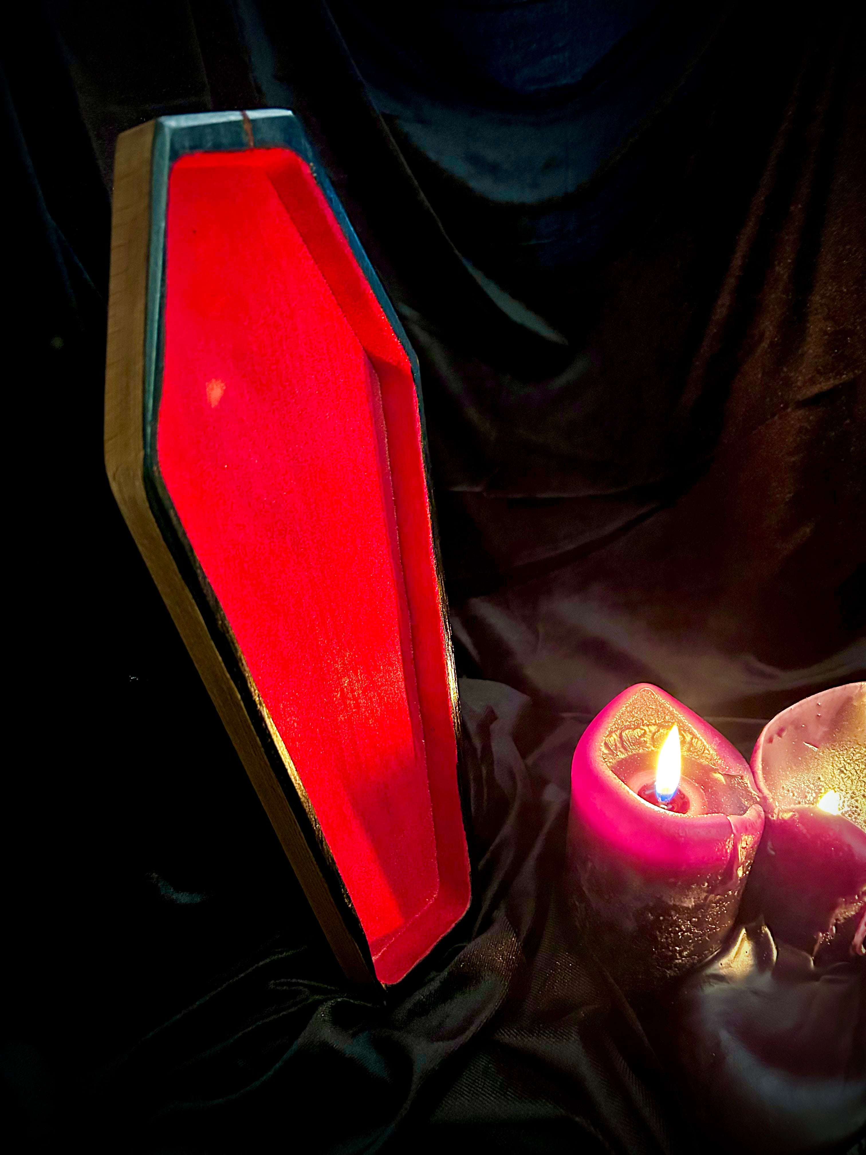 Natural wood coffin tray with flocked interior.