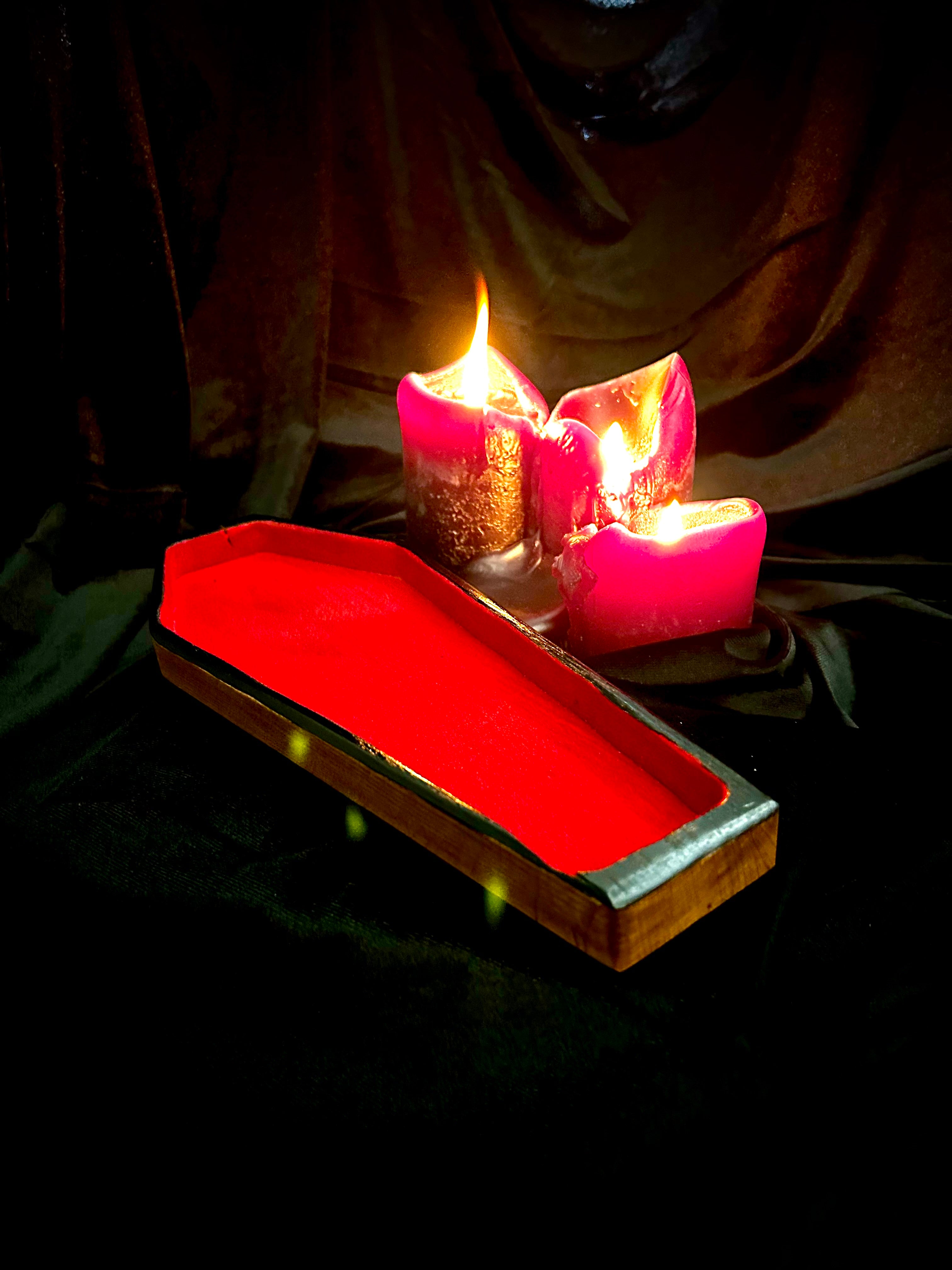 Natural wood coffin tray with flocked interior.