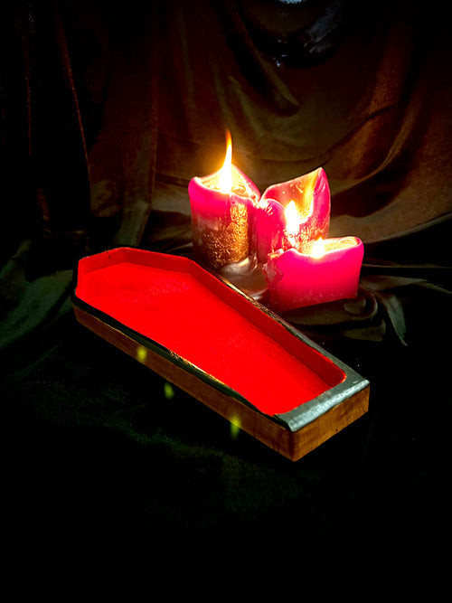 Natural wood coffin tray with flocked interior.